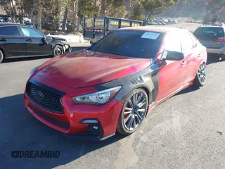2021 Infiniti Q50 Red Sport 400 with VIN JN1FV7DP3MM850783, listed as a IAAI auction lot 41335175 with 59,113 mi miles and . Bid and sale history available at DreamBid. Image 19.