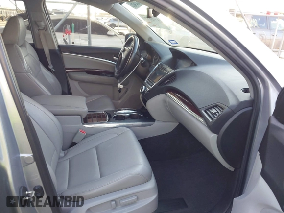 2016 Acura MDX w/Tech with VIN 5FRYD3H4XGB021609, listed as a IAAI auction lot 41459777 with 103,294 mi miles. Bid and sale history available at carsss.com. Image 5.