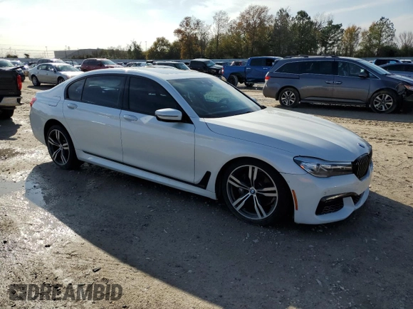 2016 BMW 7 Series 740i with VIN WBA7E2C58GG548314, listed as a Copart auction lot 72876922 with 74,981 mi miles. Bid and sale history available at carsss.com. Image 4.