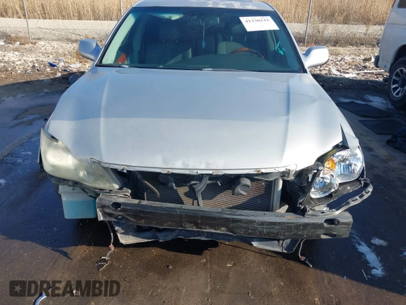 2005 Toyota Avalon XL z VIN 4T1BK36B75U044022, wystawiony jako IAAI lot #41330241 z przebiegiem 196 362 mil mil oraz . Historia ofert i sprzedaży dostępna na DreamBid. Obrazek 13.