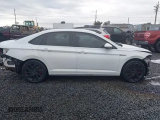 2019 Volkswagen Jetta GLI S z VIN 3VW6T7BU2KM202992, wystawiony jako IAAI lot #40896812 z przebiegiem 44 348 mil mil oraz . Historia ofert i sprzedaży dostępna na DreamBid. Obrazek 14.