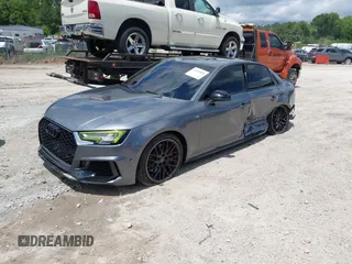2018 Audi A4 Premium Plus z VIN WAUENAF4XJA095831, wystawiony jako IAAI lot #42192885 z przebiegiem 77 645 mil mil oraz . Historia ofert i sprzedaży dostępna na DreamBid. Obrazek 2.