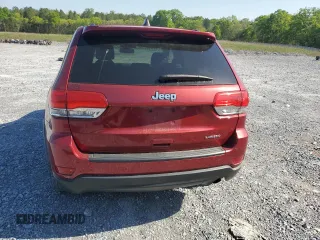 2014 Jeep Grand Cherokee Laredo with VIN 1C4RJEAG7EC274573, listed as a Copart auction lot 52637255 with 156,409 mi miles and Salvage Title. Bid and sale history available at DreamBid. Image 6.