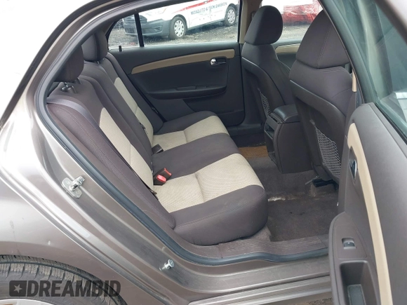 2011 Chevrolet Malibu 1LS with VIN 1G1ZB5E18BF251602, listed as a IAAI auction lot 41880910 with 76,049 mi miles and . Bid and sale history available at DreamBid. Image 8.