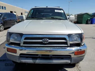1997 Toyota 4Runner SR5 z VIN JT3HN86RXV0057844, wystawiony jako Copart lot #55357775 z przebiegiem 308 521 mil mil oraz Szkoda całkowita • Salvage title. Historia ofert i sprzedaży dostępna na DreamBid. Obrazek 5.