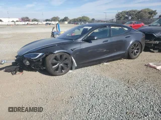 2024 Tesla Model S with VIN 5YJSA1E57RF545269, listed as a Copart auction lot 87419784 with Not provided miles and Salvage title. Bid and sale history available at DreamBid. Image 1.