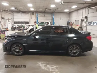 2011 Subaru Impreza Sedan WRX WRX Premium with VIN JF1GV7F6XBG517651, listed as a IAAI auction lot 41158551 with 141,334 mi miles. Bid and sale history available at carsss.com. Image 14.