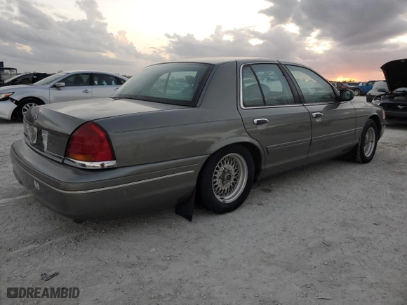 1999 Ford Crown Victoria LX with VIN 2FAFP74W7XX234277, listed as a Copart auction lot 84859854 with 0 mi miles and Clean Title. Bid and sale history available at carsss.com. Image 3.
