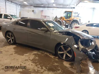 2017 Dodge Charger SE with VIN 2C3CDXBG0HH546619, listed as a IAAI auction lot 41617484 with 105,574 mi miles. Bid and sale history available at carsss.com. Image 1.