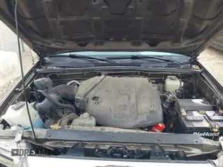 2015 Toyota Tacoma with VIN 3TMLU4EN8FM198605, listed as a IAAI auction lot 42039238 with 132,109 mi miles and . Bid and sale history available at DreamBid. Image 10.