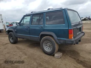 1996 Jeep Cherokee Sport with VIN 1J4FJ68S3TL251074, listed as a Copart auction lot 59593955 with 181,482 mi miles and Salvage title. Bid and sale history available at DreamBid. Image 2.
