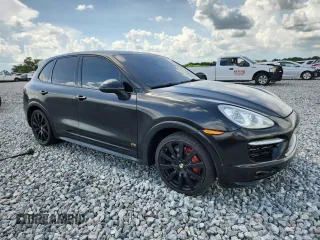 2013 Porsche Cayenne GTS with VIN WP1AD2A25DLA75526, listed as a Copart auction lot 60520865 with Not provided miles and Salvage title. Bid and sale history available at DreamBid. Image 4.