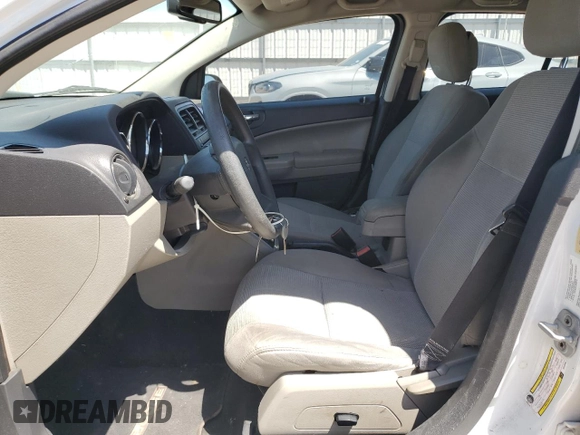 2011 Dodge Caliber Mainstreet with VIN 1B3CB3HA3BD123598, listed as a Copart auction lot 51631155 with 148,317 mi miles and Salvage Title. Bid and sale history available at carsss.com. Image 7.
