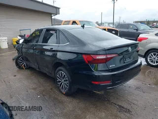 2020 Volkswagen Jetta S z VIN 3VWC57BU6LM085223, wystawiony jako IAAI lot #42562706 z przebiegiem 80 290 mil mil oraz . Historia ofert i sprzedaży dostępna na DreamBid. Obrazek 3.
