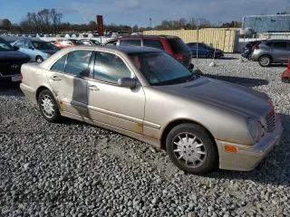 2002 Mercedes-Benz E-Class with VIN WDBJF82J12X062460, listed as a Copart auction lot 79264964 with 113,725 mi miles and Salvage Title. Bid and sale history available at carsss.com. Image 4.