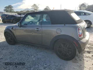 2011 MINI Convertible with VIN WMWZN3C53BT133576, listed as a Copart auction lot 87543835 with 69,999 mi miles and Salvage title. Bid and sale history available at DreamBid. Image 2.
