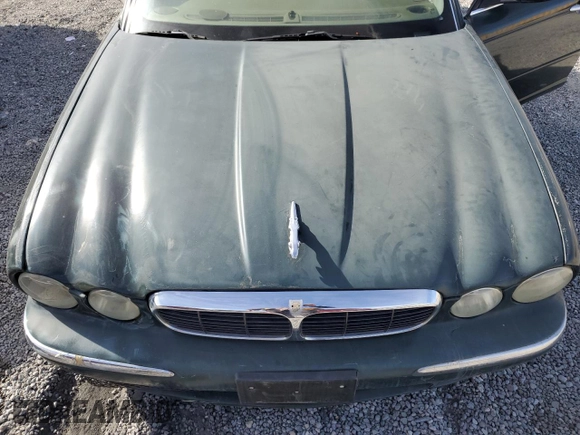 2004 Jaguar XJ with VIN SAJWA71C34SG29498, listed as a Copart auction lot 42653715 with 116,956 mi miles and Salvage Title. Bid and sale history available at carsss.com. Image 11.