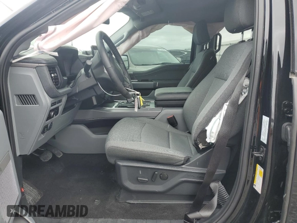 2024 Ford F-150 Lightning Flash with VIN 1FT6W3L76RWG12085, listed as a Copart auction lot 87181614 with 17,444 mi miles and Salvage title. Bid and sale history available at DreamBid. Image 7.