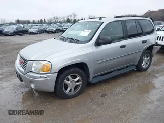 2006 GMC Envoy SLT with VIN 1GKDT13SX62342147, listed as a IAAI auction lot 40873738 with 159,092 mi miles. Bid and sale history available at carsss.com. Image 2.