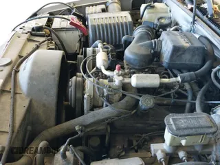 1999 Chevrolet Suburban with VIN 3GNFK16R4XG258423, listed as a IAAI auction lot 43541377 with 300,968 mi miles and . Bid and sale history available at DreamBid. Image 13.