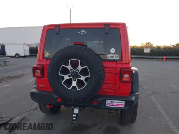 2022 Jeep Wrangler Unlimited Rubicon with VIN 1C4HJXFN4NW261809, listed as a IAAI auction lot 41459519 with 30,422 mi miles and . Bid and sale history available at DreamBid. Image 16.