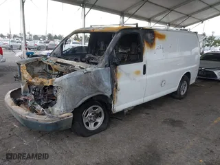 2006 GMC Savana Cargo Van with VIN 1GTFG15X961128838, listed as a IAAI auction lot 41521596 with 1 mi miles. Bid and sale history available at carsss.com. Image 2.