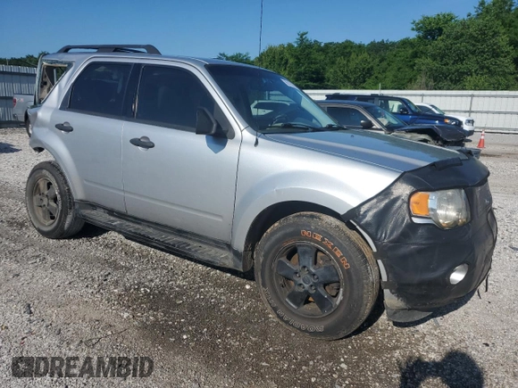 2010 Ford Escape XLS with VIN 1FMCU0C73AKA52802, listed as a Copart auction lot 60100185 with 141,541 mi miles and Clean title. Bid and sale history available at DreamBid. Image 4.
