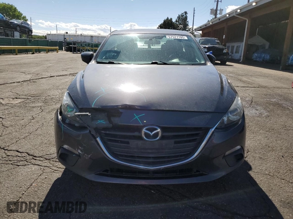 2015 Mazda 3 i Sport z VIN 3MZBM1U70FM215164, wystawiony jako Copart lot #57527785 z przebiegiem 144 621 mil mil oraz Szkoda całkowita • Salvage title. Historia ofert i sprzedaży dostępna na DreamBid. Obrazek 5.