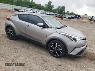 2018 Toyota C-HR XLE with VIN NMTKHMBX3JR013289, listed as a Copart auction lot 56950645 with 98,123 mi miles and Salvage title. Bid and sale history available at DreamBid. Image 4.