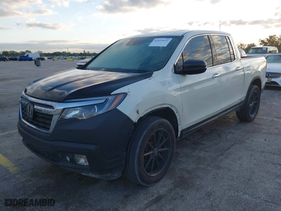 2019 Honda Ridgeline RTL-E with VIN 5FPYK3F72KB003139, listed as a IAAI auction lot 42031632 with 165,007 mi miles. Bid and sale history available at carsss.com. Image 18.
