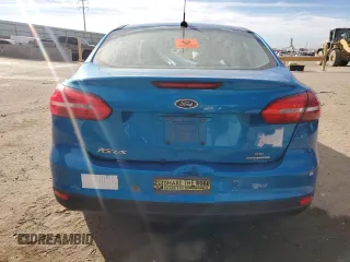 2016 Ford Focus SE with VIN 1FADP3F23GL212607, listed as a Copart auction lot 86732334 with 36,607 mi miles and Salvage title. Bid and sale history available at DreamBid. Image 6.