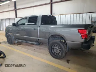 2016 Nissan Titan SV with VIN 1N6BA1F11GN517457, listed as a Copart auction lot 60994175 with 102,321 mi miles and Clean title. Bid and sale history available at DreamBid. Image 2.
