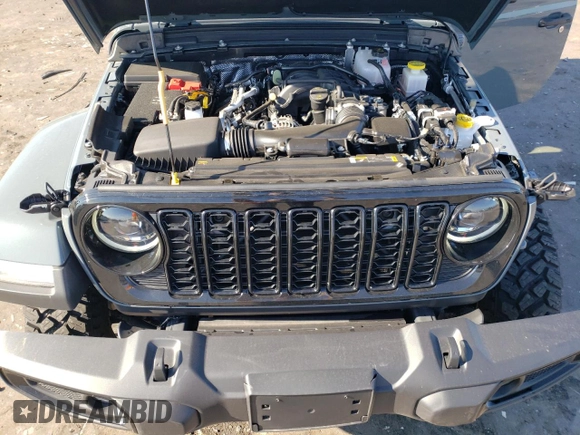 2024 Jeep Gladiator Sport z VIN 1C6HJTAG0RL117318, wystawiony jako Copart lot #67834434 z przebiegiem 2 331 mil mil oraz Szkoda całkowita • Salvage title. Historia ofert i sprzedaży dostępna na DreamBid. Obrazek 11.