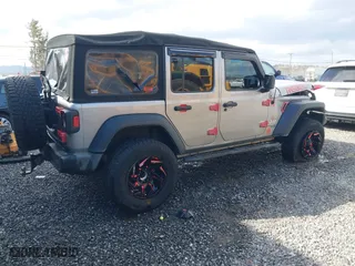 2018 Jeep Wrangler Unlimited Sport S with VIN 1C4HJXDG0JW250952, listed as a IAAI auction lot 41641476 with 117,284 mi miles. Bid and sale history available at carsss.com. Image 4.