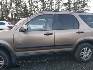 2003 Honda CR-V EX with VIN JHLRD788X3C004304, listed as a IAAI auction lot 41385254 with 143,940 mi miles. Bid and sale history available at carsss.com. Image 14.