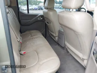 2009 Nissan Frontier SE z VIN 1N6AD09WX9C423595, wystawiony jako IAAI lot #42210046 z przebiegiem 117 142 mil mil oraz . Historia ofert i sprzedaży dostępna na DreamBid. Obrazek 8.