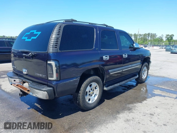 2004 Chevrolet Tahoe LT with VIN 1GNEC13Z44J125913, listed as a IAAI auction lot 42027889 with 205,796 mi miles. Bid and sale history available at carsss.com. Image 4.