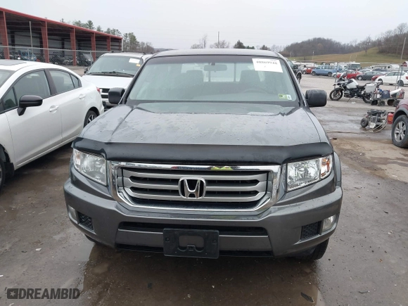2012 Honda Ridgeline RT with VIN 5FPYK1F24CB456298, listed as a IAAI auction lot 40869948 with 123,329 mi miles. Bid and sale history available at carsss.com. Image 12.