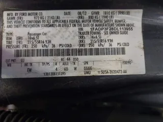2013 Ford Focus SE with VIN 1FADP3F28DL113955, listed as a IAAI auction lot 41924051 with 107,858 mi miles. Bid and sale history available at carsss.com. Image 9.
