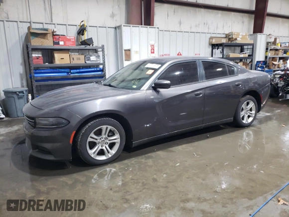 2015 Dodge Charger SE with VIN 2C3CDXBG0FH856606, listed as a Copart auction lot 87711675 with 190,537 mi miles and Salvage Title. Bid and sale history available at carsss.com. Image 1.