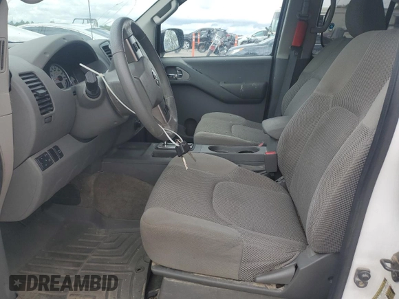 2012 Nissan Frontier Pro-4X с VIN 1N6AD0EV5CC409902, выставлен на аукционе Copart как лот 55239945 с пробегом 124 288 миль миль и Списание • Salvage title. История ставок и продаж доступна на DreamBid. Изображение 7.