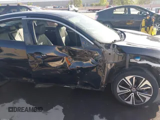 2016 Honda Civic Sedan EX-L with VIN 19XFC1F73GE215112, listed as a IAAI auction lot 42093218 with 67,233 mi miles. Bid and sale history available at carsss.com. Image 6.