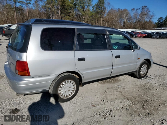 1997 Honda Odyssey with VIN RA11239041, listed as a Copart auction lot 85819024 with 79,952 mi miles and Salvage title. Bid and sale history available at DreamBid. Image 3.