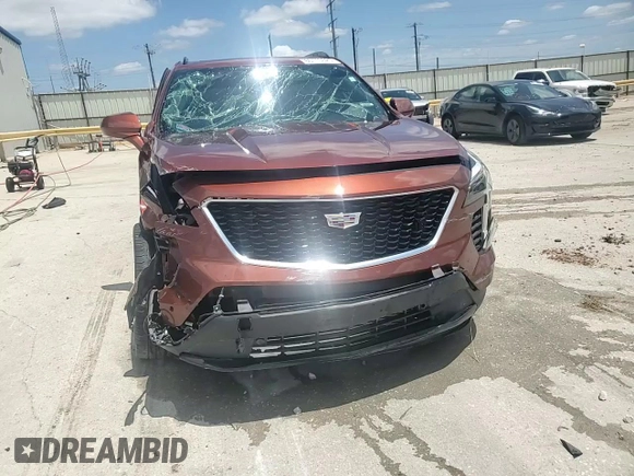 2020 Cadillac XT4 FWD Sport z VIN 1GYFZER45LF025992, wystawiony jako Copart lot #60110325 z przebiegiem 43 820 mil mil oraz Szkoda całkowita • Salvage title. Historia ofert i sprzedaży dostępna na DreamBid. Obrazek 14.