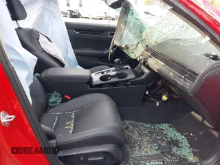 2023 Honda Civic Touring z VIN 2HGFE1F90PH309059, wystawiony jako IAAI lot #42146353 z przebiegiem Nie podano mil oraz . Historia ofert i sprzedaży dostępna na DreamBid. Obrazek 5.