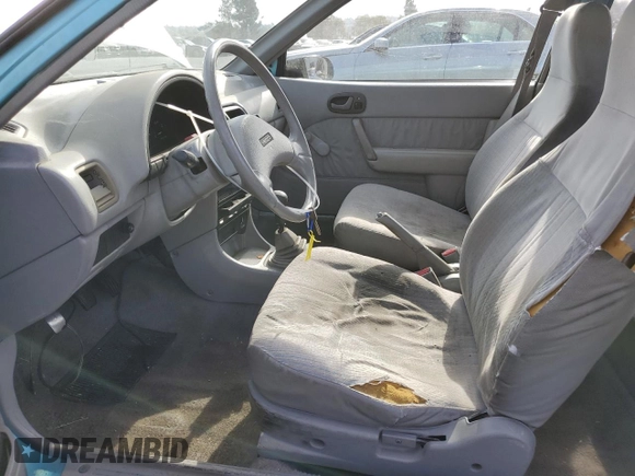 1992 Geo Metro z VIN 2C1MS2465N6782913, wystawiony jako Copart lot #77405574 z przebiegiem 77 080 mil mil oraz Szkody całkowita. Historia ofert i sprzedaży dostępna na DreamBid. Obrazek 7.