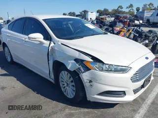 2016 Ford Fusion SE Hybrid with VIN 3FA6P0LU1GR385184, listed as a IAAI auction lot 39230513 with 106,311 mi miles. Bid and sale history available at carsss.com. Image 1.