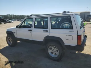 1995 Jeep Cherokee Sport with VIN 1J4FJ68S0SL646747, listed as a Copart auction lot 48772675 with 239,834 mi miles and Salvage title. Bid and sale history available at DreamBid. Image 2.