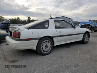 1988 Toyota Supra z VIN JT2MA71J0J0088041, wystawiony jako Copart lot #84402804 z przebiegiem 195 921 mil mil oraz Czysty tytuł • Clean title. Historia ofert i sprzedaży dostępna na DreamBid. Obrazek 3.