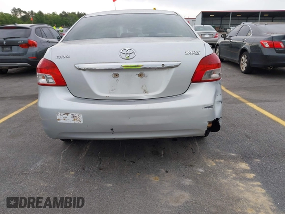 2009 Toyota Yaris with VIN JTDBT903394043218, listed as a IAAI auction lot 41974570 with 281,000 mi miles. Bid and sale history available at carsss.com. Image 14.